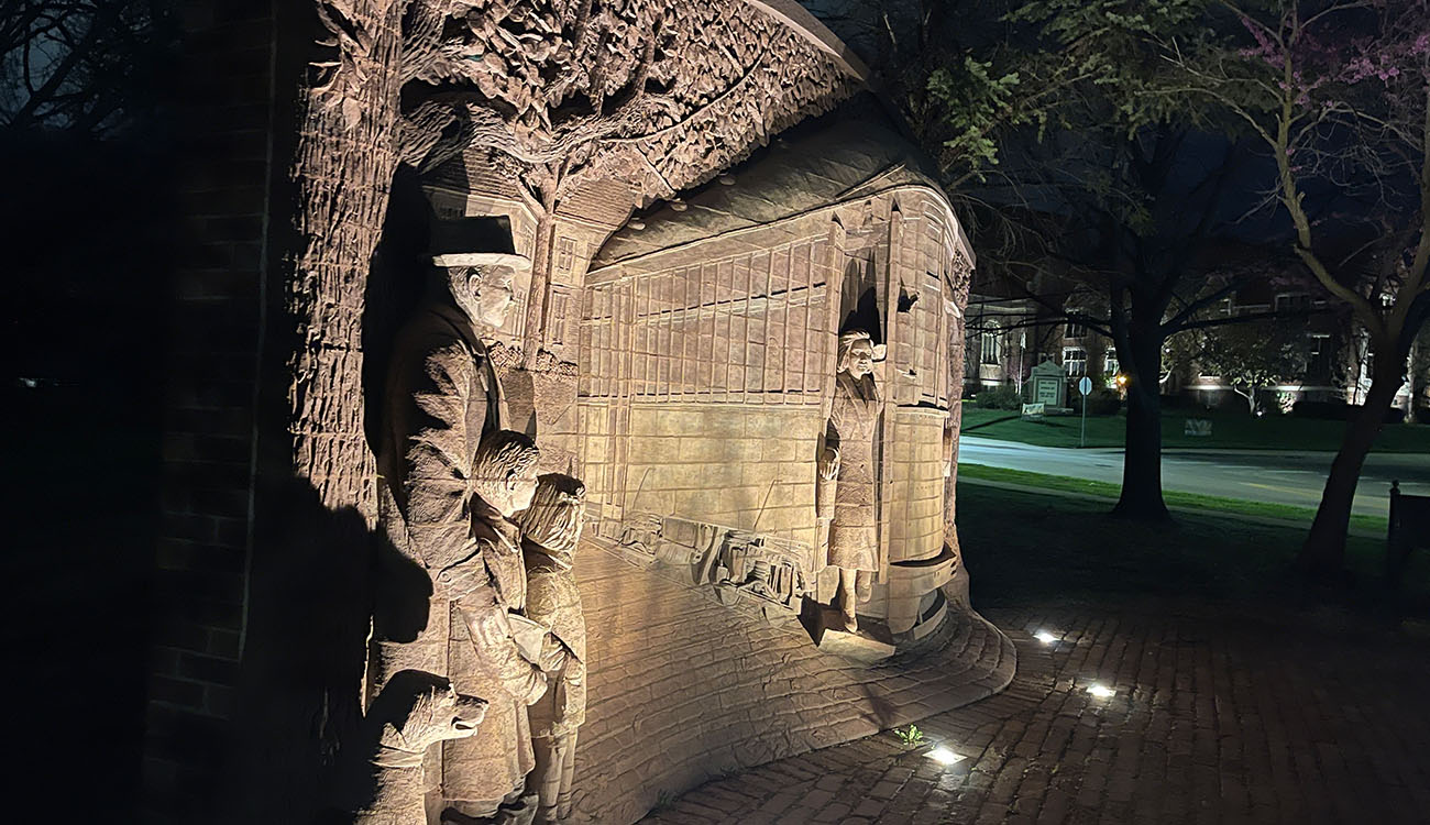 Close-up of monument lighting installation by a commercial lighting contractor showcasing precision uplighting design.