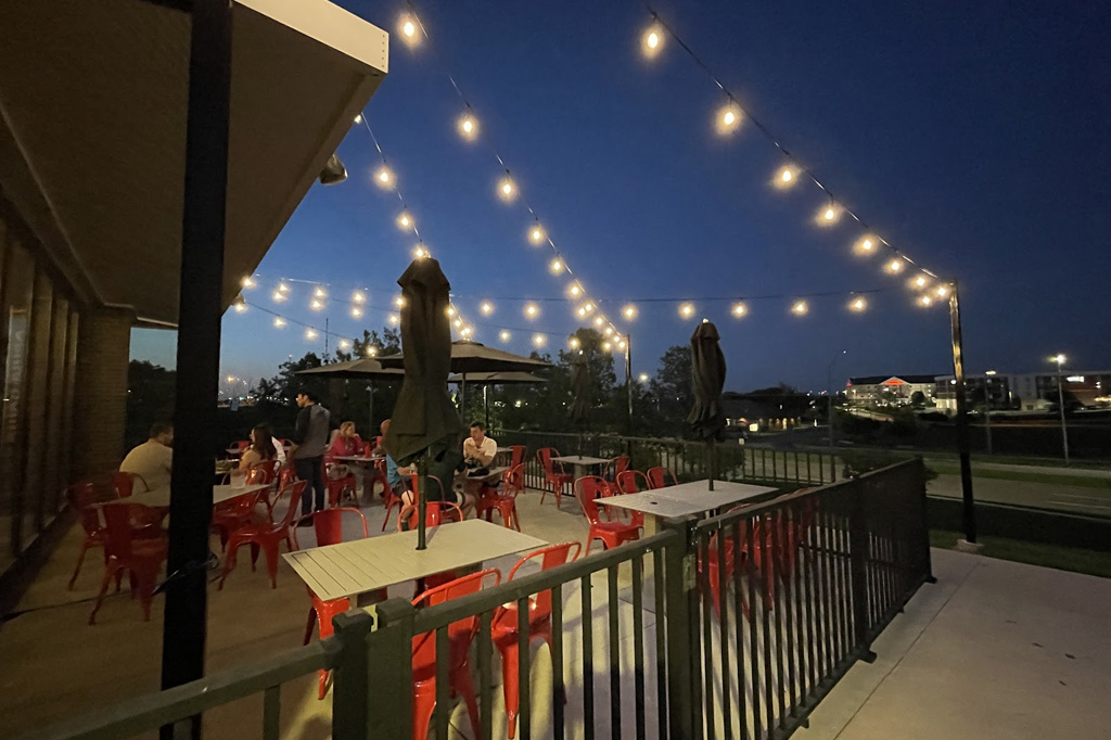 Landscape lighting in Saunders County with string lights at dusk