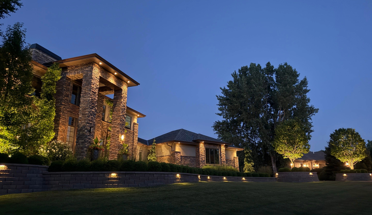 Outdoor lighting system highlighting pathways and landscaping
