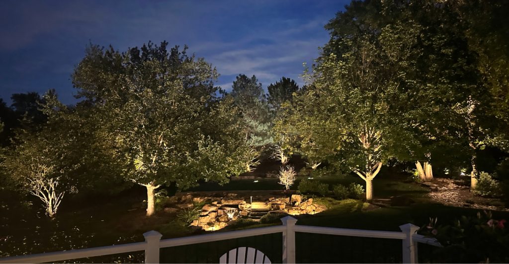 landscape lighting omaha neighborhoods west omaha home with LED uplights and path lights at night