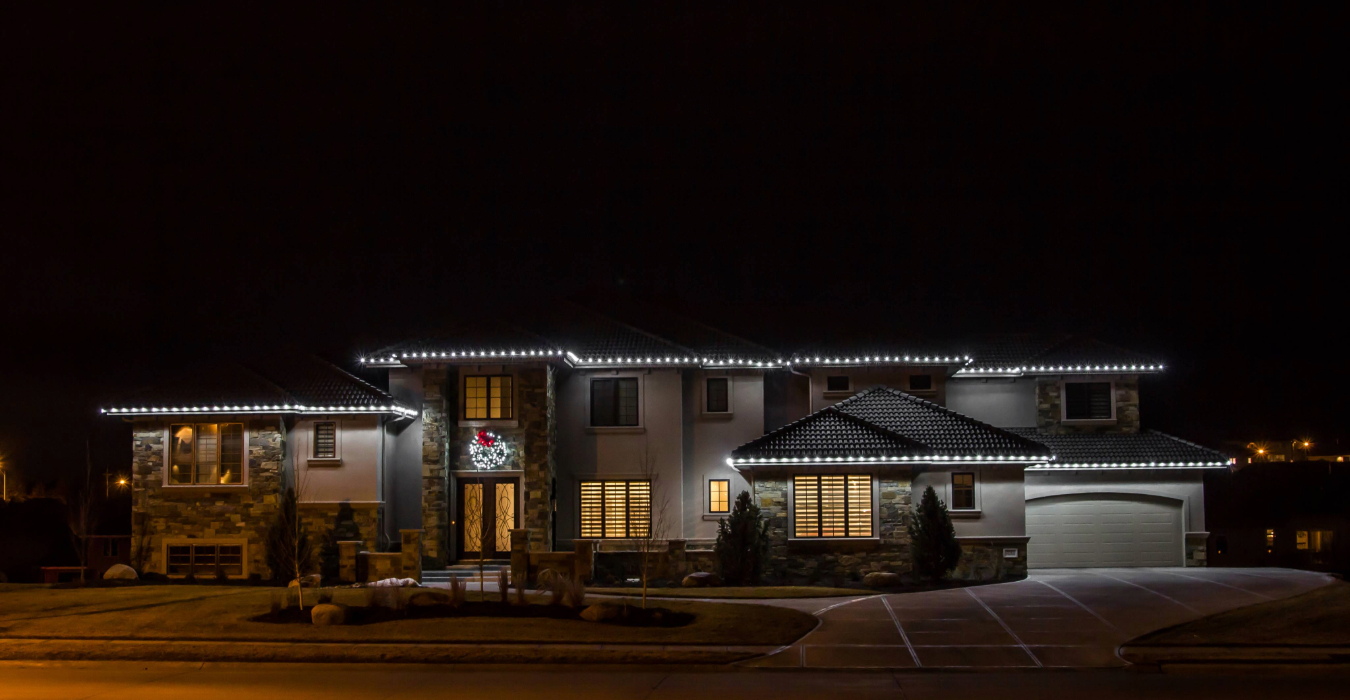 permanent christmas lights omaha warm white accent lighting suburban Nebraska home